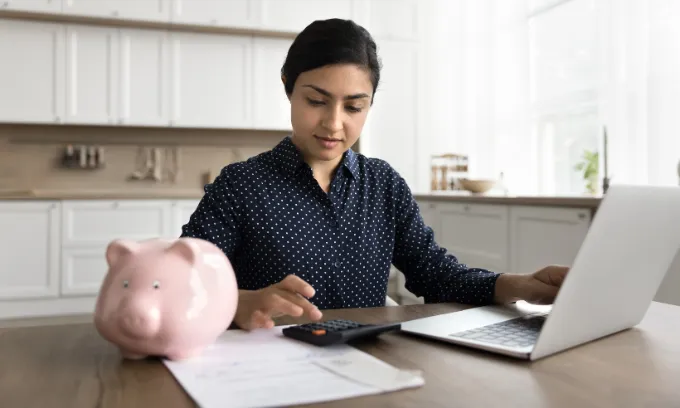 Woman saving money.
