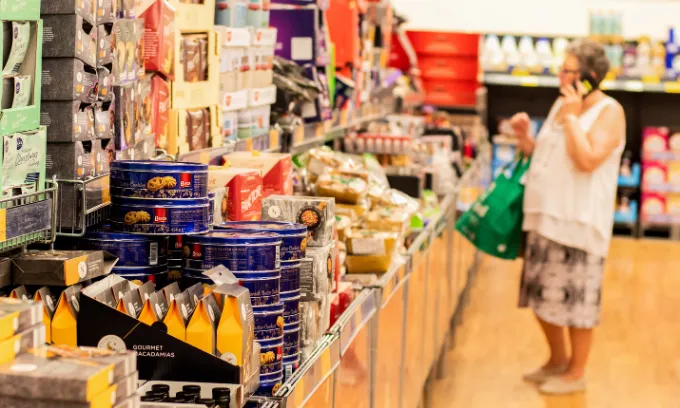 A woman shopping Aldi's special buys.