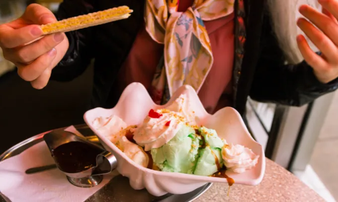 A bowl of ice cream sundae. 