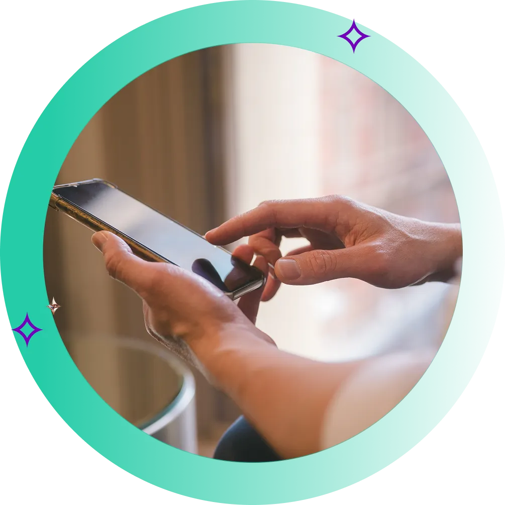 Banner image of man holding mobile phone in a hotel