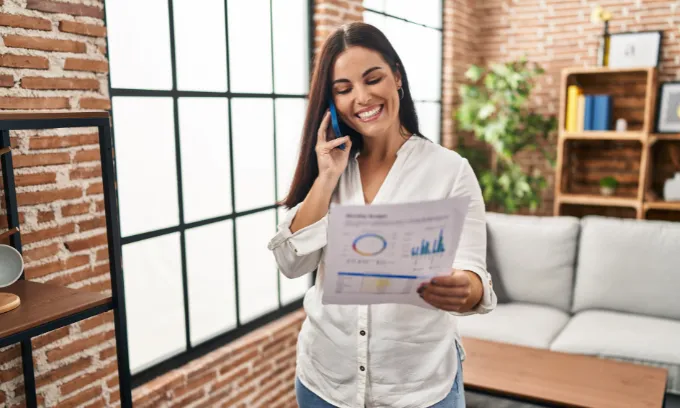 Woman looking happy after switching her energy provider.
