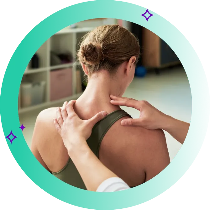 A woman having her trapezius muscle assessed by a physiotherapist