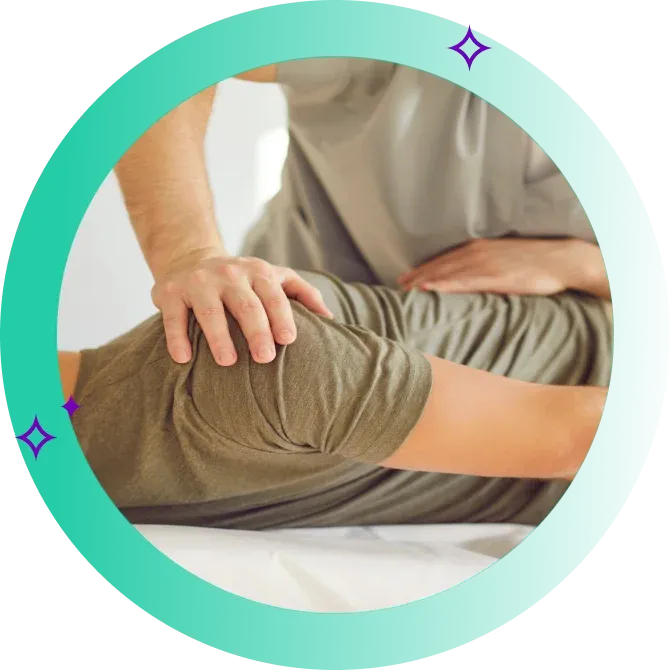 A chiropractor gives adjustment to customer