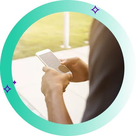 Man scrolling on his mobile phone comparing mobile plans