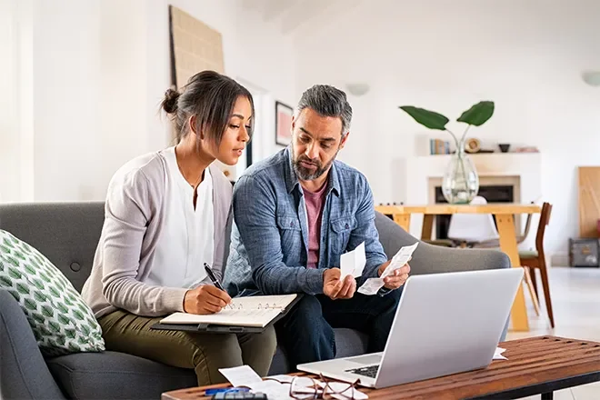 Couple comparing power plans