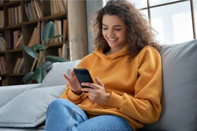 Person using phone to compare internet plans