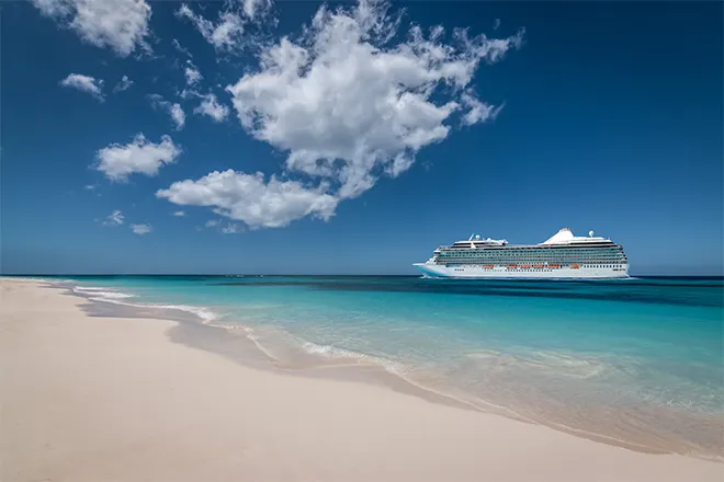 Cruise liner by tropical beach