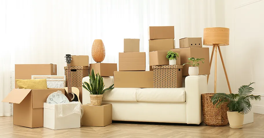 Sofa and packing boxes ready for a home move