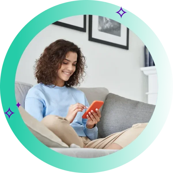 Person sits on couch and researches Australia's fastest NBN providers and plans