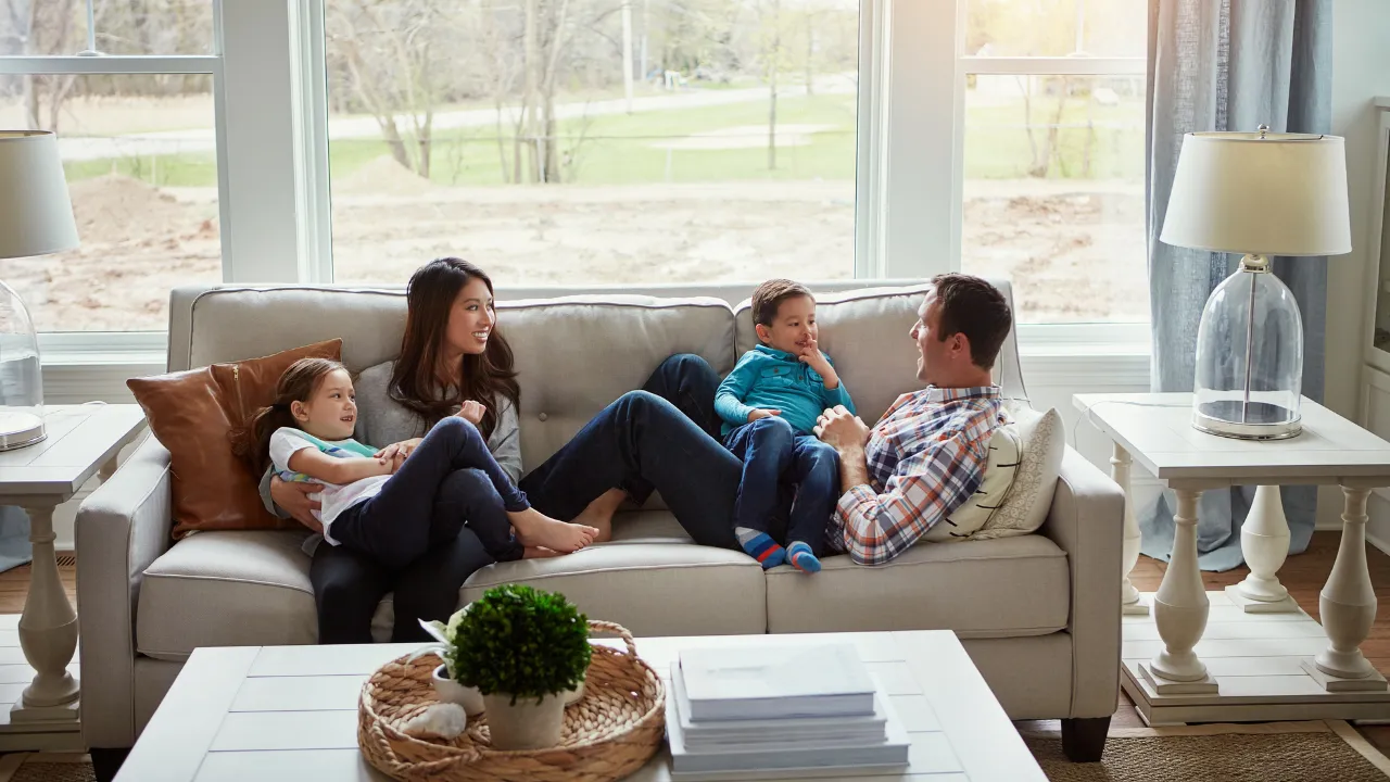 A family lounging in their home