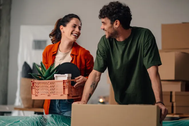 Couple moving into their home