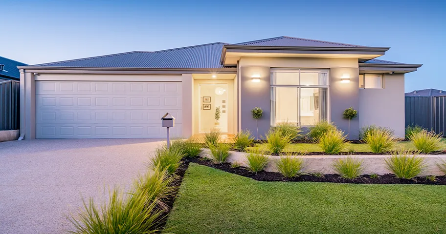 New single-level home with garage, driveway and simple landscaping