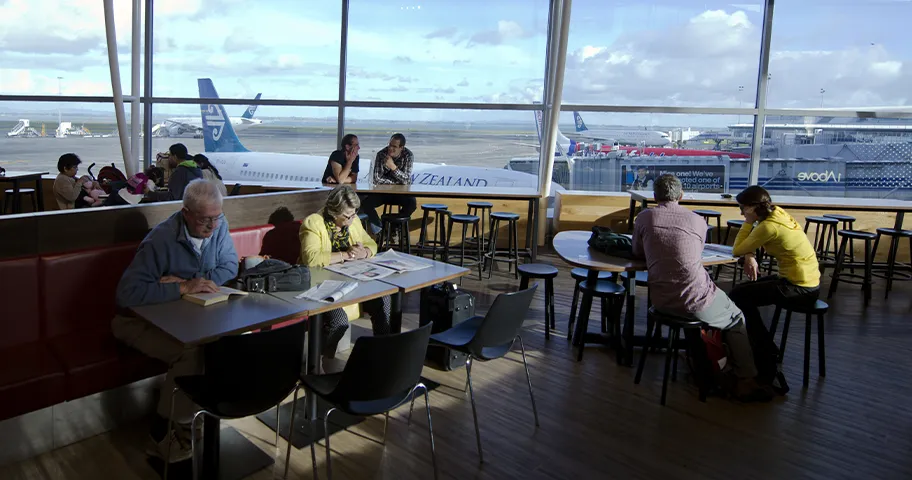 Passengers waiting for flights at Auckland International Airport.