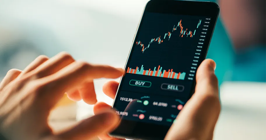 Person using share-trading app.