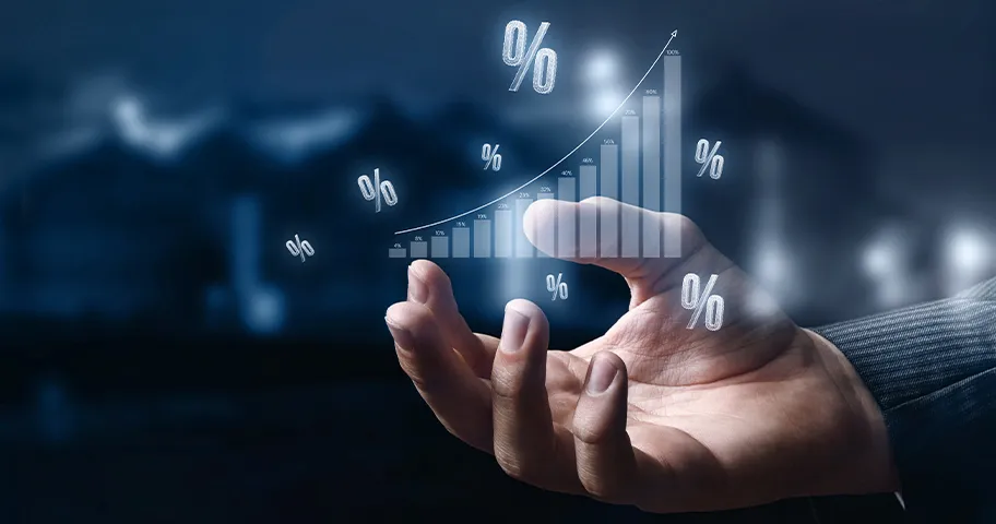 Graphic of hand under graph indicating interest rate rises