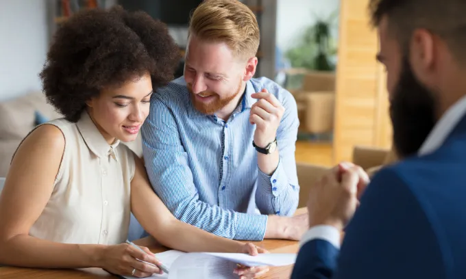 A professional couple applying for an LMI waiver for professionals