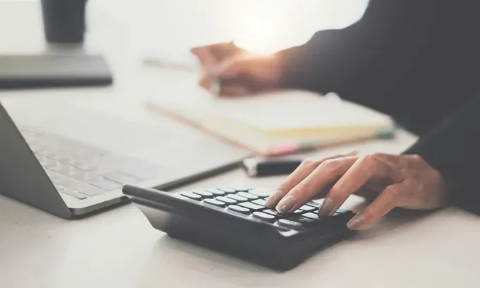 A woman considers her personal loan options as an unemployed person.