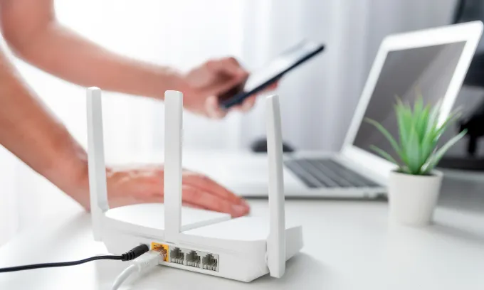 Close up of a person connecting to the internet.