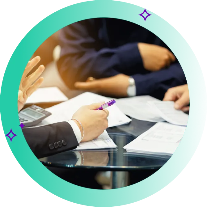 A mortgage broker going through a potential buyer's paper finances.