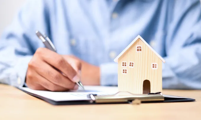 A non-Australian resident signs up for a new home loan.