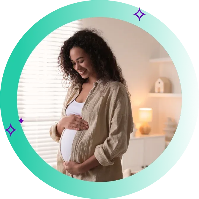 Happy pregnant person holds belly