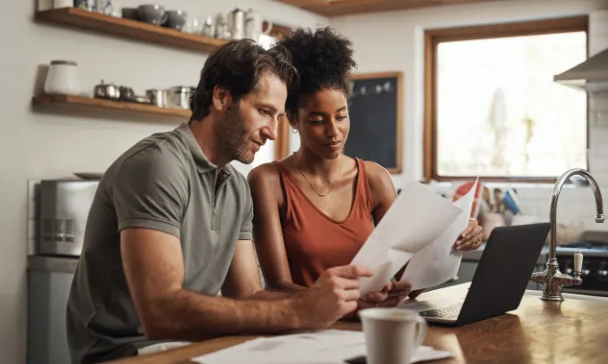 Couple looking at finances.