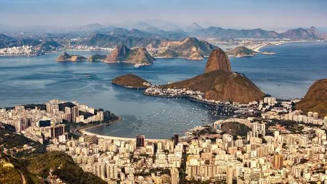 The famous Sugarloaf mountain sticks out of Guanabara Bay.