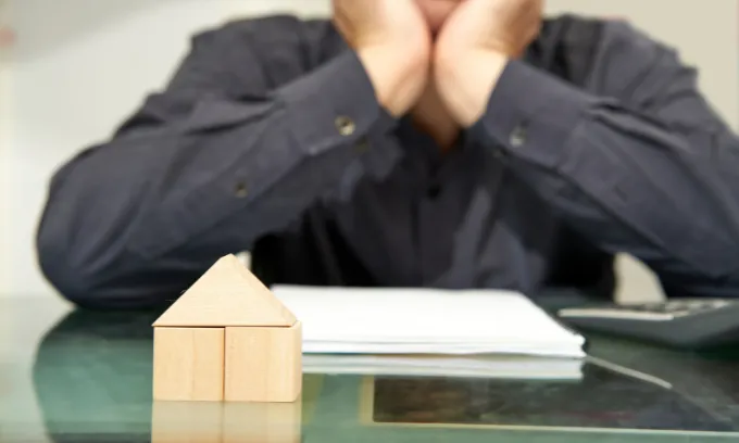 Man looking at his home loan.