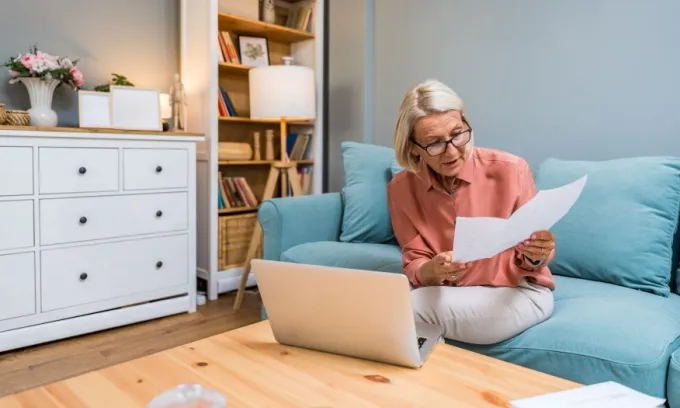 Person comparing energy plans. Image: Srdjan Randjelovic/Shutterstock.com