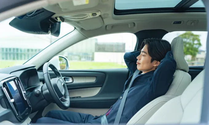 Person in a self-driving car.