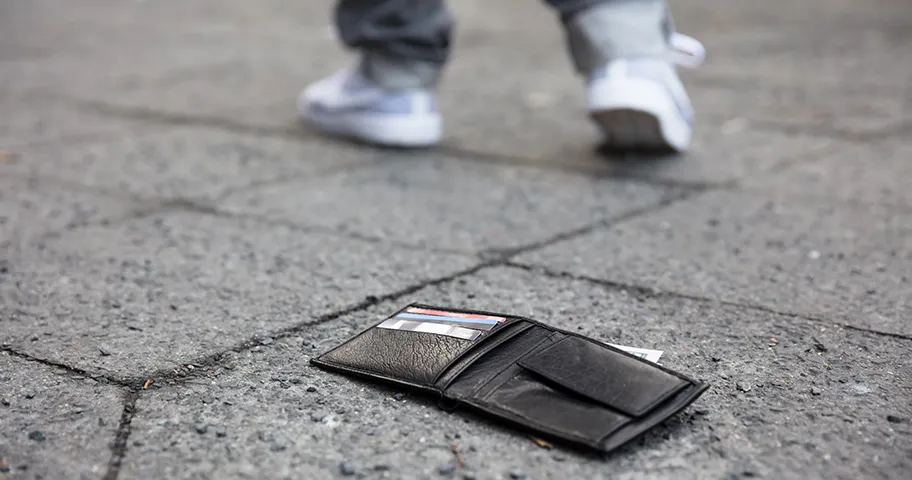 Man Walking After Losing His Wallet On Street