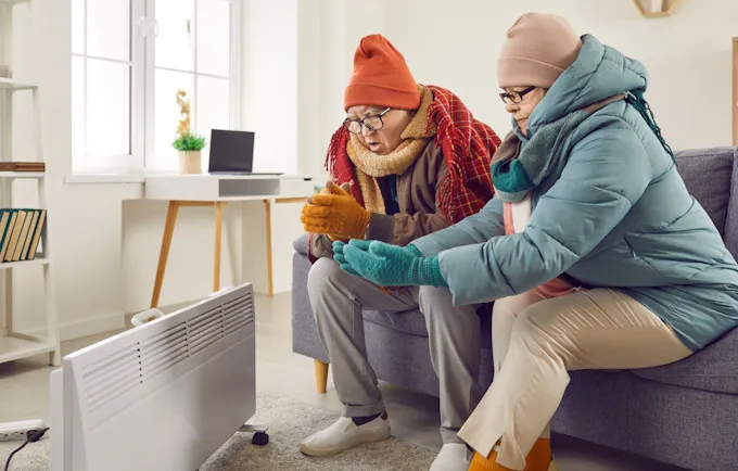 Worried family wrapped in warm coat