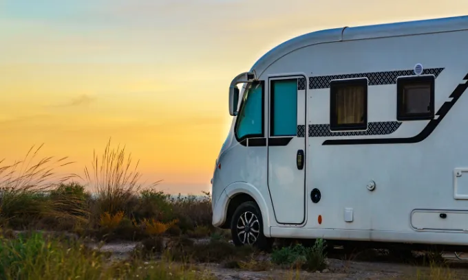 Camper rv camping on sea shore