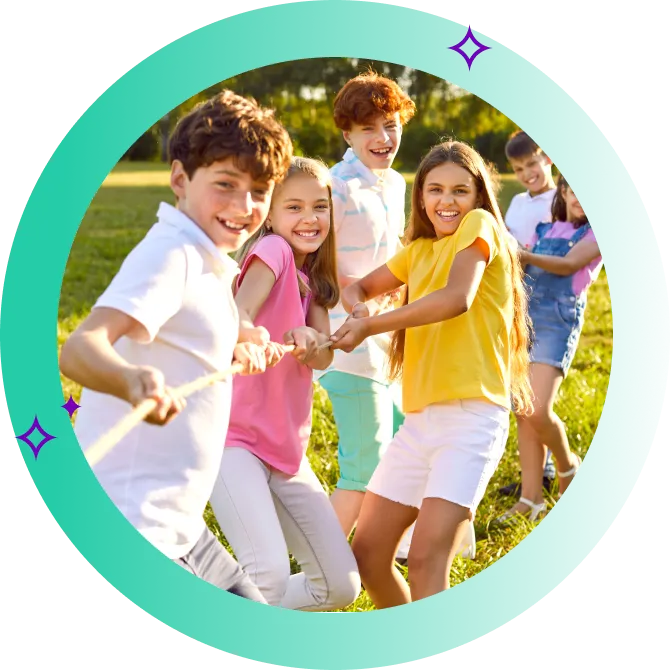 A group of children playing tug of war