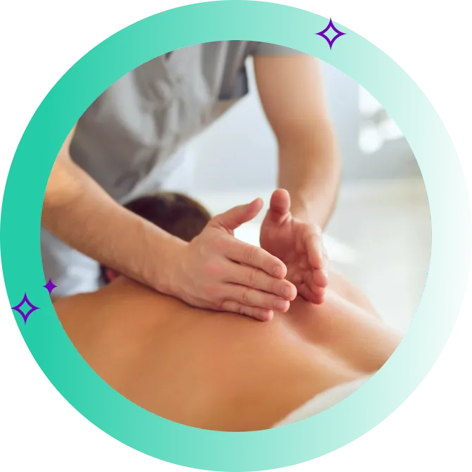 A massage therapist treats a patient.