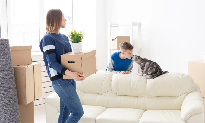 A woman and child who have clearly just moved into a new home.